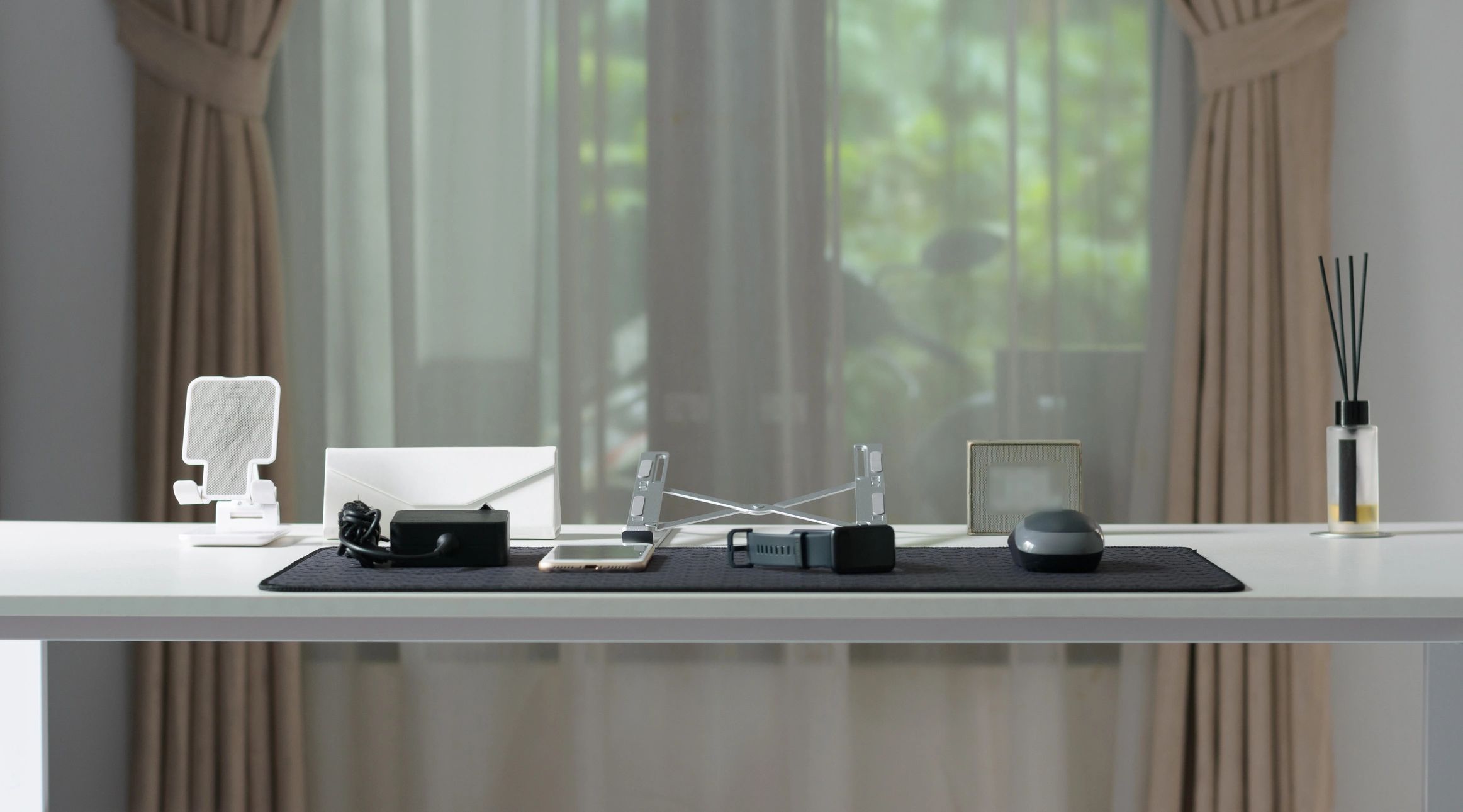 Calm, light-filled home office for telehealth counseling